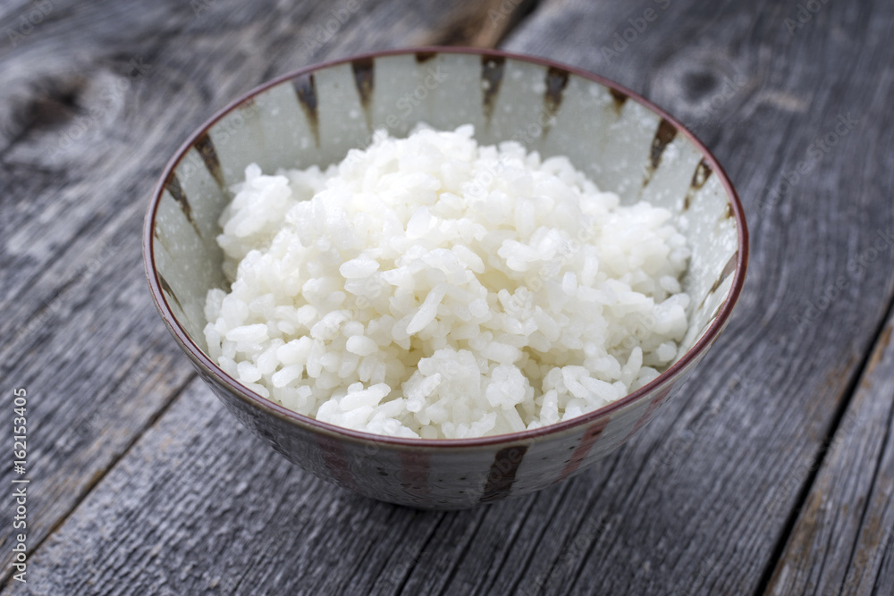 Traditional Japanese Koshihikari Rice as close-up in a bowl Traditional Japanese Koshihikari Rice as close-up in a bowl