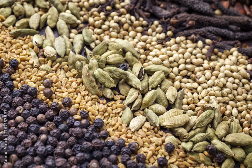 Naklejka premium Traditional international grain and seed as spice as close-up