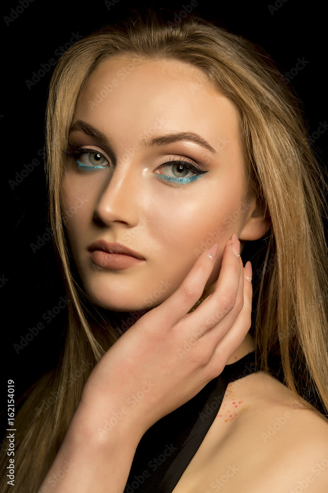 Wonderful woman with natural makeup and lush blonde hair Wonderful woman with natural makeup and lush blonde hair