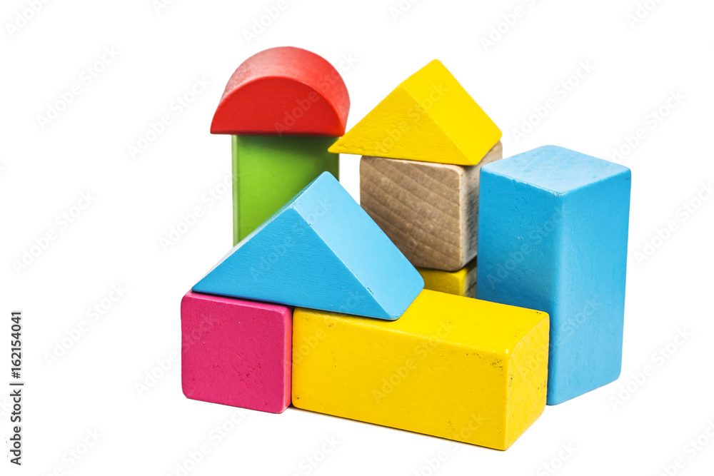 Fototapeta premium Building blocks on wooden background,Colorful wooden building blocks
