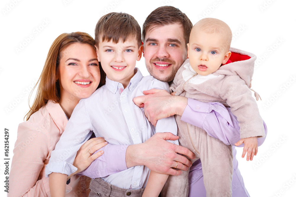 Close-up portrait of  Happy and smiles Family with children and infant on a white background isolated