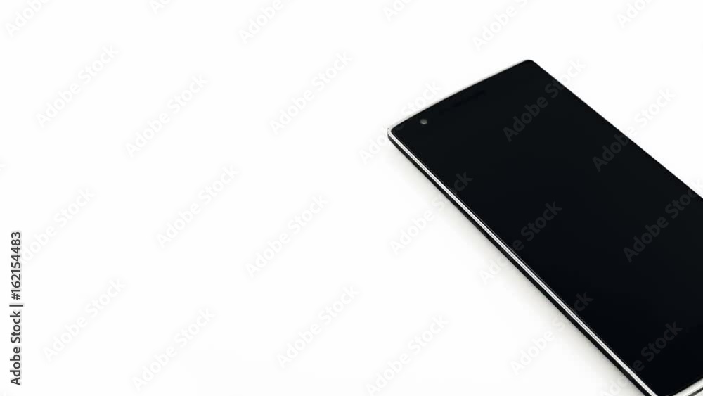 Black Smart Phone On White Background Panning Movement Black Smart Phone On White Background Panning Movement