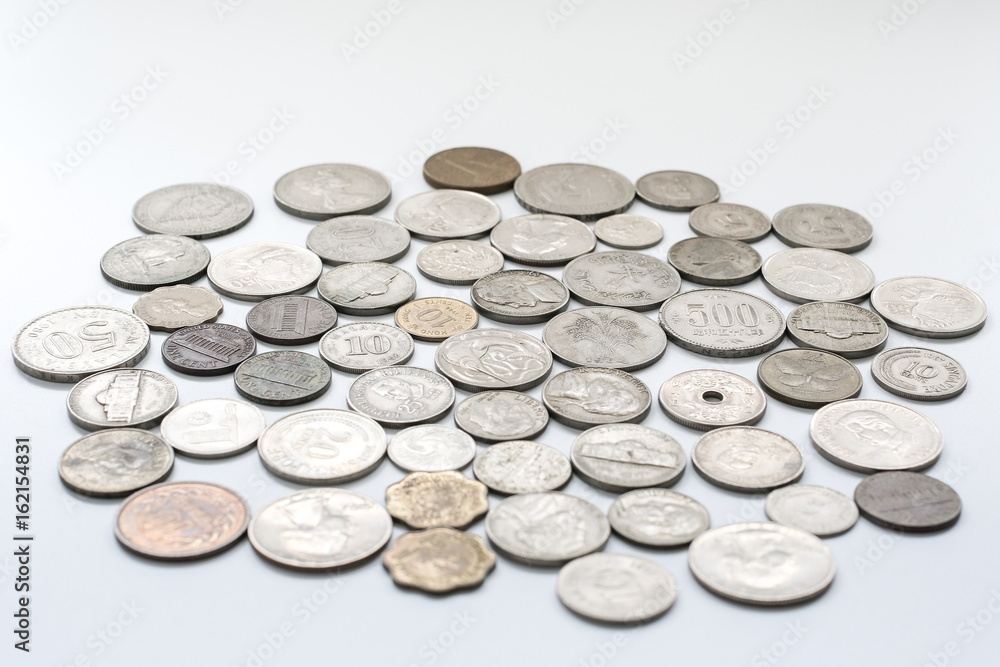 Many different coins collection on white background Many different coins collection on white background