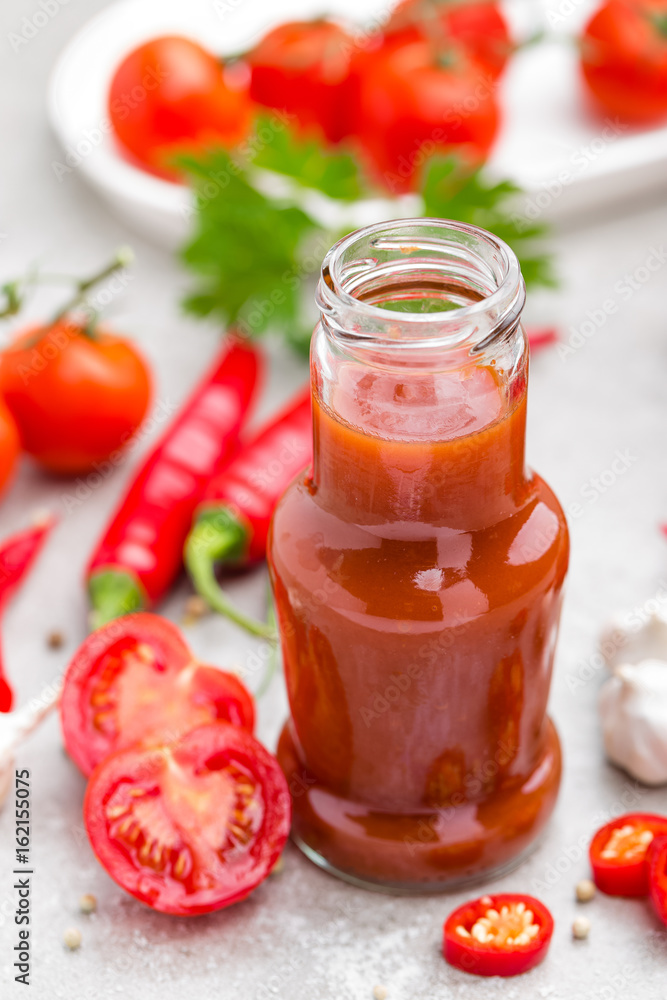 Tomato ketchup, chilli sauce, tomatos puree with chili pepper, tomatoes and garlic Tomato ketchup, chilli sauce, tomatos puree with chili pepper, tomatoes and garlic
