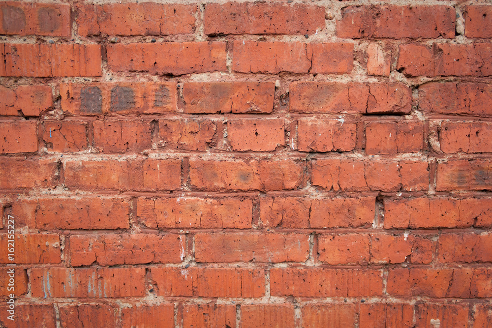Old cracked brick wall texture Old cracked brick wall texture