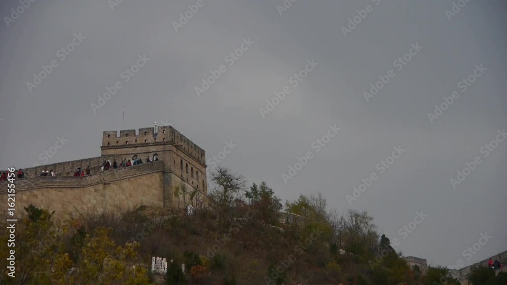 visitor climbing Great Wall on mountain peak,China ancient architecture,fortress. visitor climbing Great Wall on mountain peak,China ancient architecture,fortress.