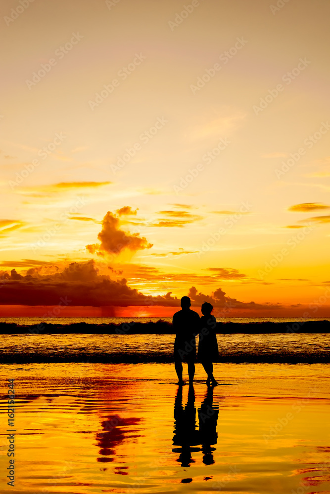 Silhouette lover on sand beach with sunset in twilight