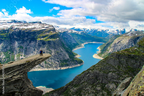 People in nature at Trolltunga (Troll's Tongue) in Norway photo