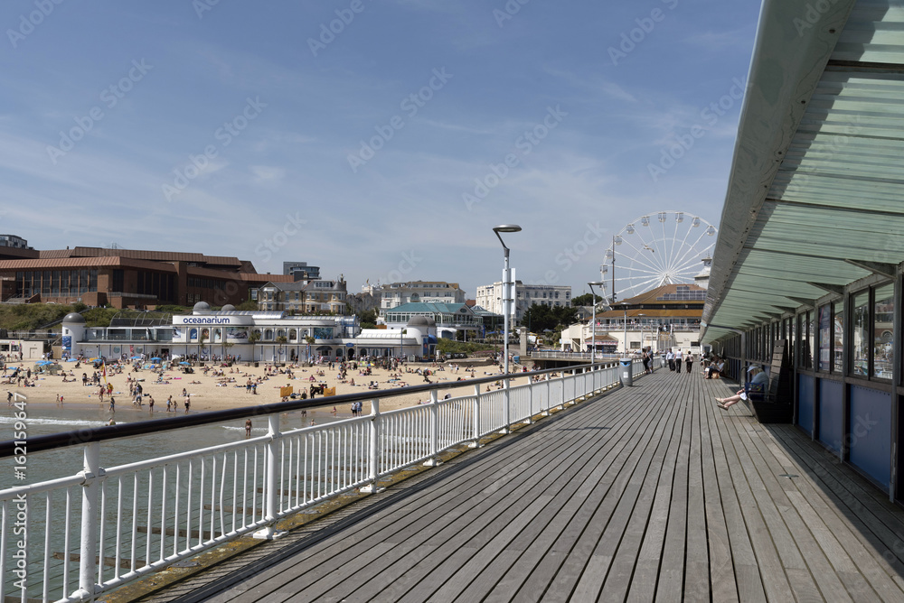 The pier and beach at Bournemouth a popular seaside resort in southern England UK. June 2017