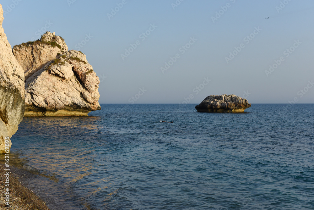 Aphrodite's rock in late afternoon lights. Petra tou Roumiu, Cyprus