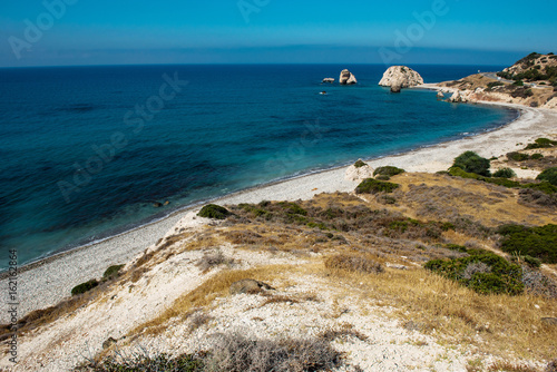 Petra tou Roumiou, Aphrodite's rock. Rocky coastline on the Mediterranean sea in Cyprus. photo