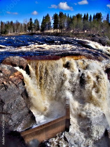 Jockfall, waterfall in the north of Sweden photo