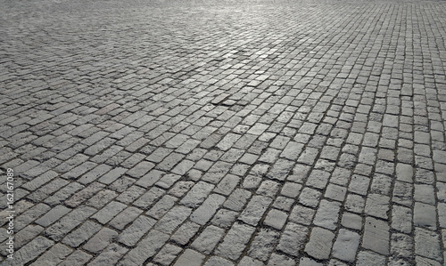 Canvas Print Abstract background of old cobblestone pavement