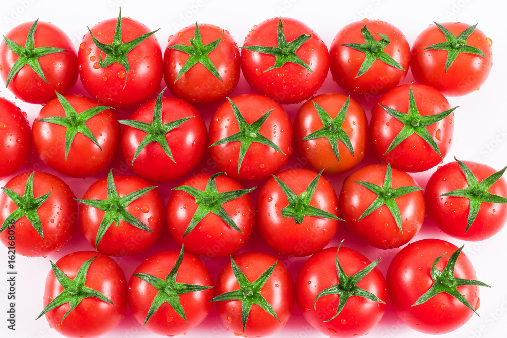 red tomatoes background on white. tomato vegetable.