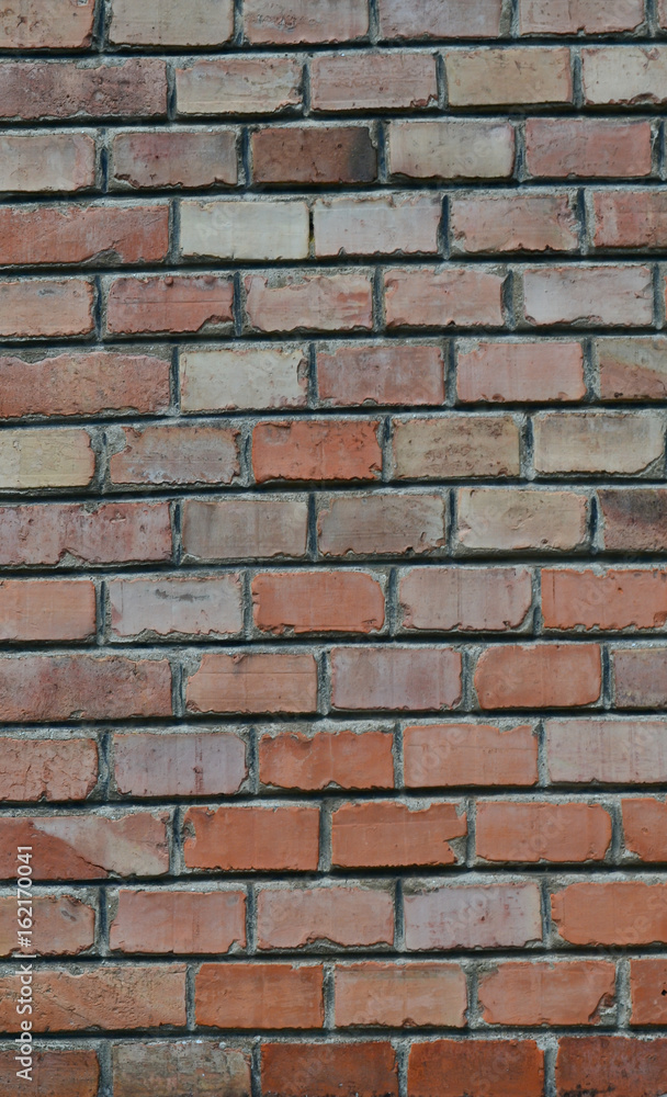 Red brick wall background, vertical view