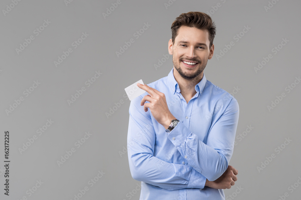 custom made wallpaper toronto digitalHandsome man in blue shirt  with white card