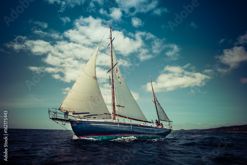 1941 cutter rigged yawl sailing in the Caribbean