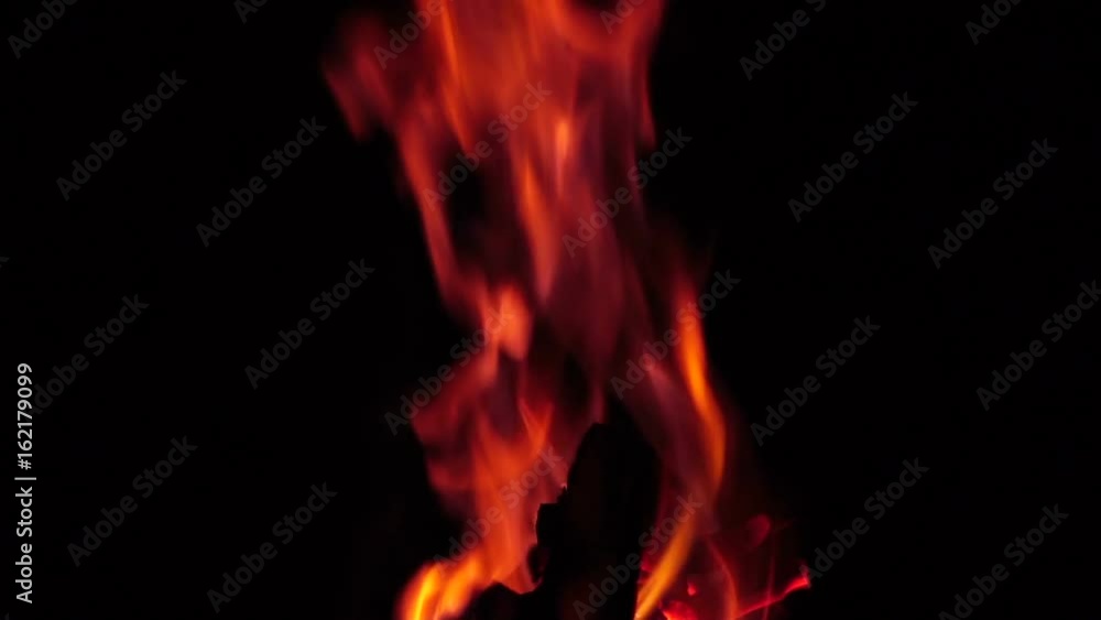 The flame of the fire at night. Slow motion The flame of the fire at night. Slow motion