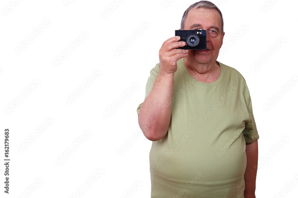 Portrait of senior elderly satisfied man taking picture with retro film camera, isolated. Experience, conservatism, travel, retro concept Portrait of senior elderly satisfied man taking picture with retro film camera, isolated. Experience, conservatism, travel, retro concept