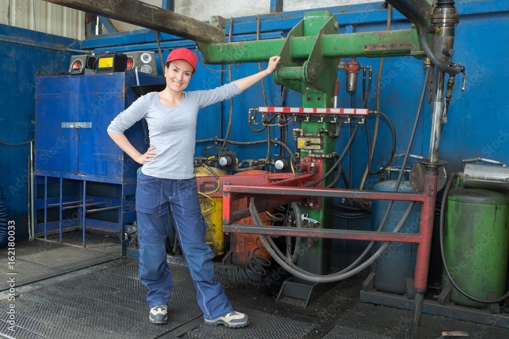 Fototapeta premium female mechanic in factory