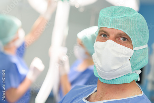 portrait of a surgeon in front of the operation room