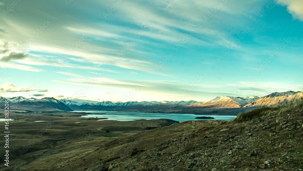 View of the mountains, lake and valey in a sunny day from mount john/ lake tekapo View of the mountains, lake and valey in a sunny day from mount john/ lake tekapo