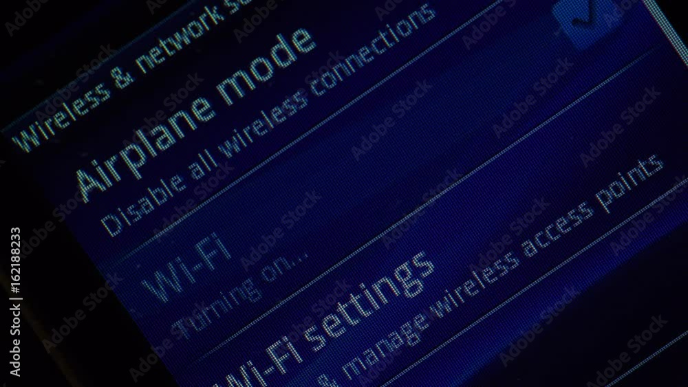 Connecting to wifi signal on mobile device, cellphone. Male finger hand touching touchscreen on modern smart phone with wi fi zone on screen, closeup 4K ProRes HQ codec Connecting to wifi signal on mobile device, cellphone. Male finger hand touching touchscreen on modern smart phone with wi fi zone on screen, closeup 4K ProRes HQ codec