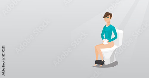 Woman suffering from diarrhea or constipation.