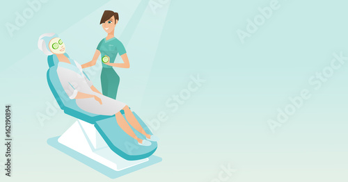 Cosmetologist making beauty treatments to a woman.