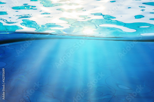 Blue swimming pool rippled water detail © Kris Tan
