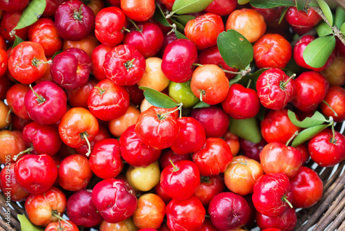 Fotografija Organic Brazilian Acerola Cherry Food Background.