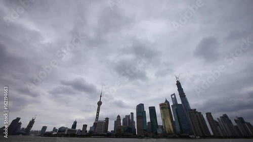 time lapse Shanghai & flying cloud,Lujiazui economic building,huangpu river. photo