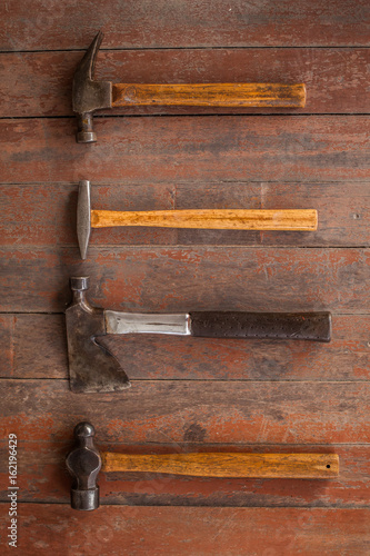 vintage old carpenter tool in the home industry on the old wood background 