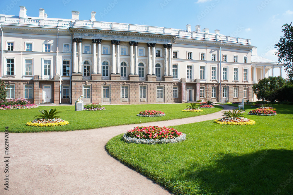 Park landscape view to  palace,flower beds and lawn  Pavlovsk,Saint-Petersburg,Russia