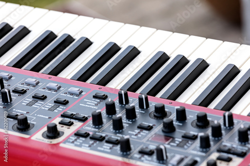 Canvas Print electronic synthesizer with keys, midi controller volume fader, knobs and slider