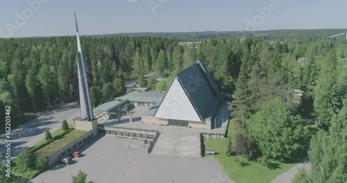 Midday aerial view of Christian church in Lahti, Finland, forward movement