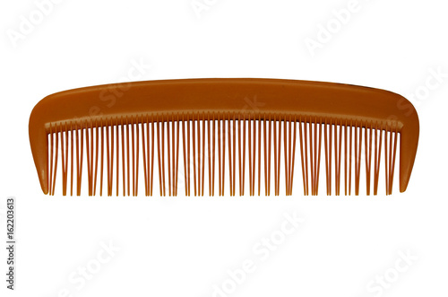 Brown Platic Comb Isolated On White Background.