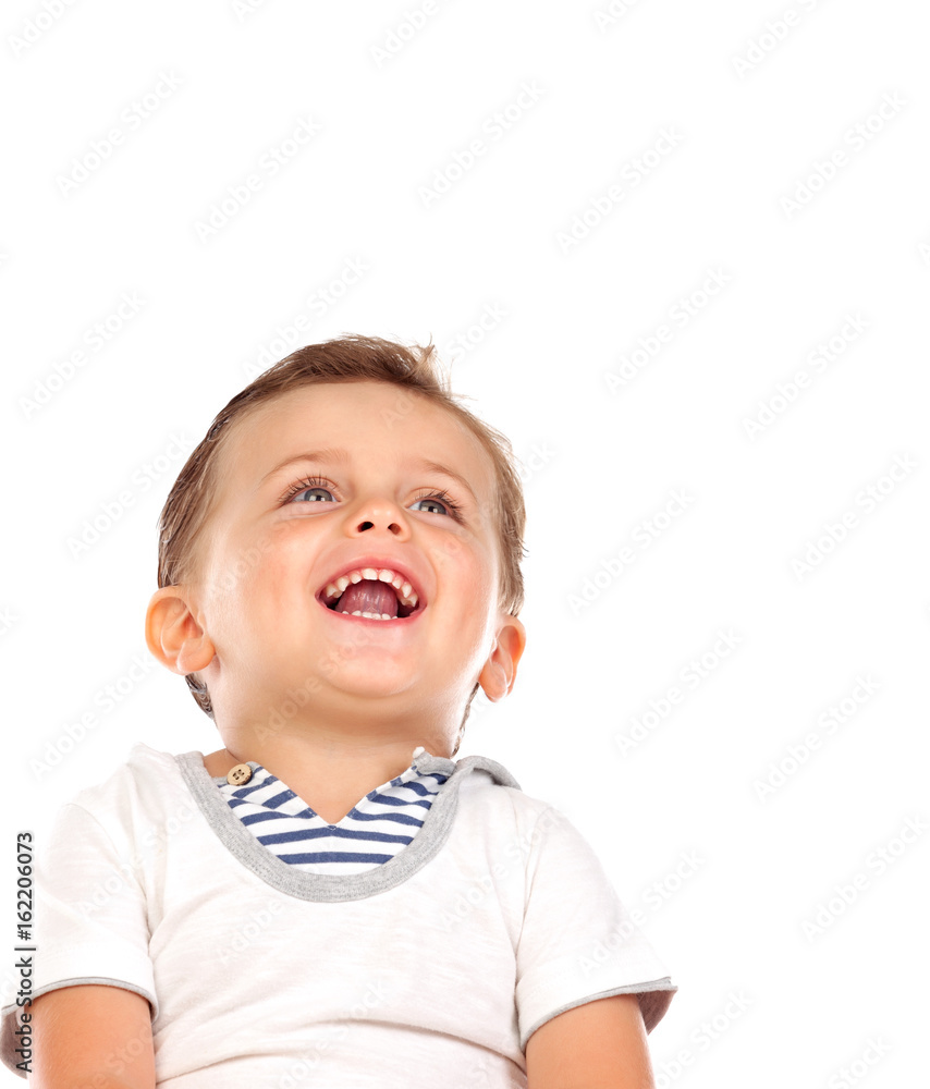 Beautiful little child with a beautiful smile looking up Beautiful little child with a beautiful smile looking up