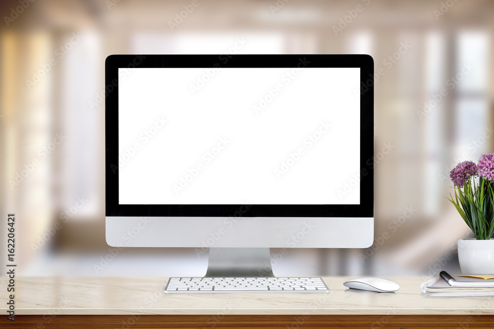 Mock up creative hipster desktop with blank white computer screen Mock up creative hipster desktop with blank white computer screen