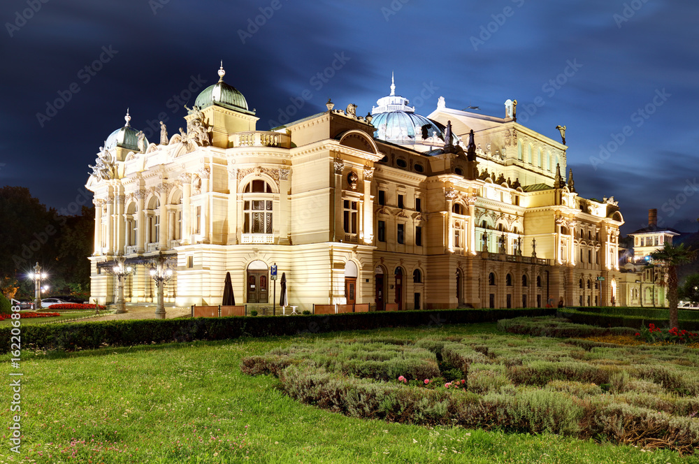 Juliusz Slowacki Theatre by night in Krakow, Poland, Eclectic style 19th century architecture.