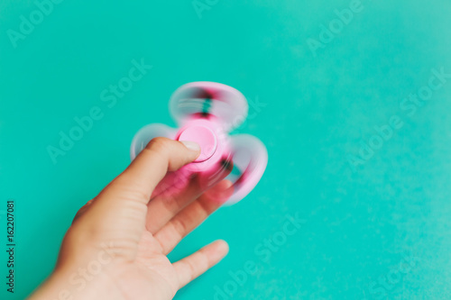 Fidget spinner in hand