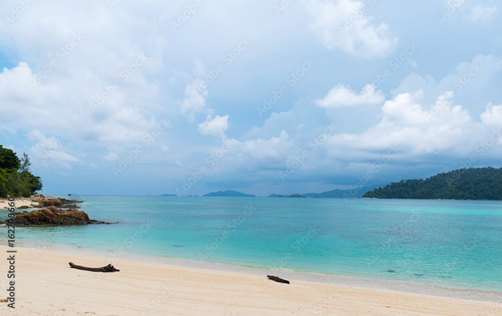 Fototapeta premium Blue ocean on sandy beach ,Holiday
