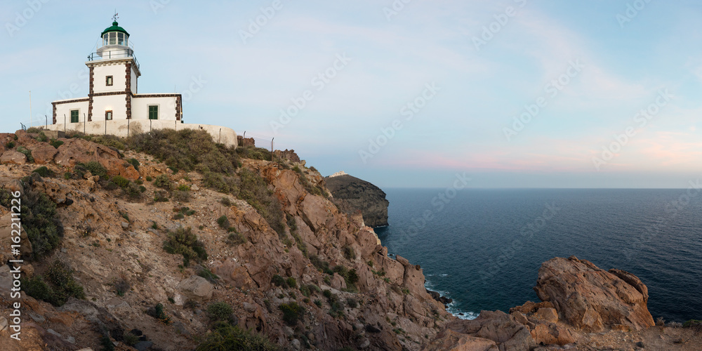 Panoramic view of Akrotiri lighthouse at dusk, Santorini island, Greece Panoramic view of Akrotiri lighthouse at dusk, Santorini island, Greece
