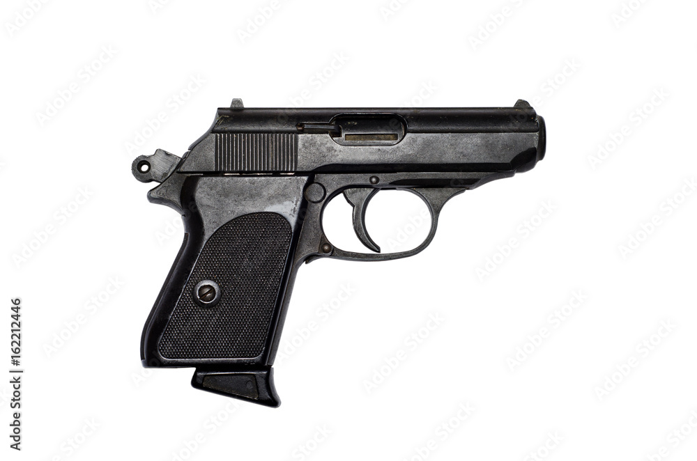 Used black metal pistol gun on white background Used black metal pistol gun on white background