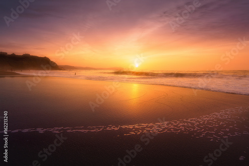 Sopelana beach at sunset photo