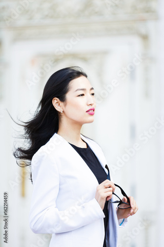 Portrait of the cheerful asian woman