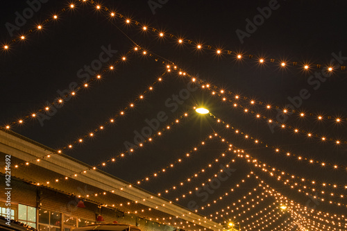 String of Light bulb decor in outdoor party.