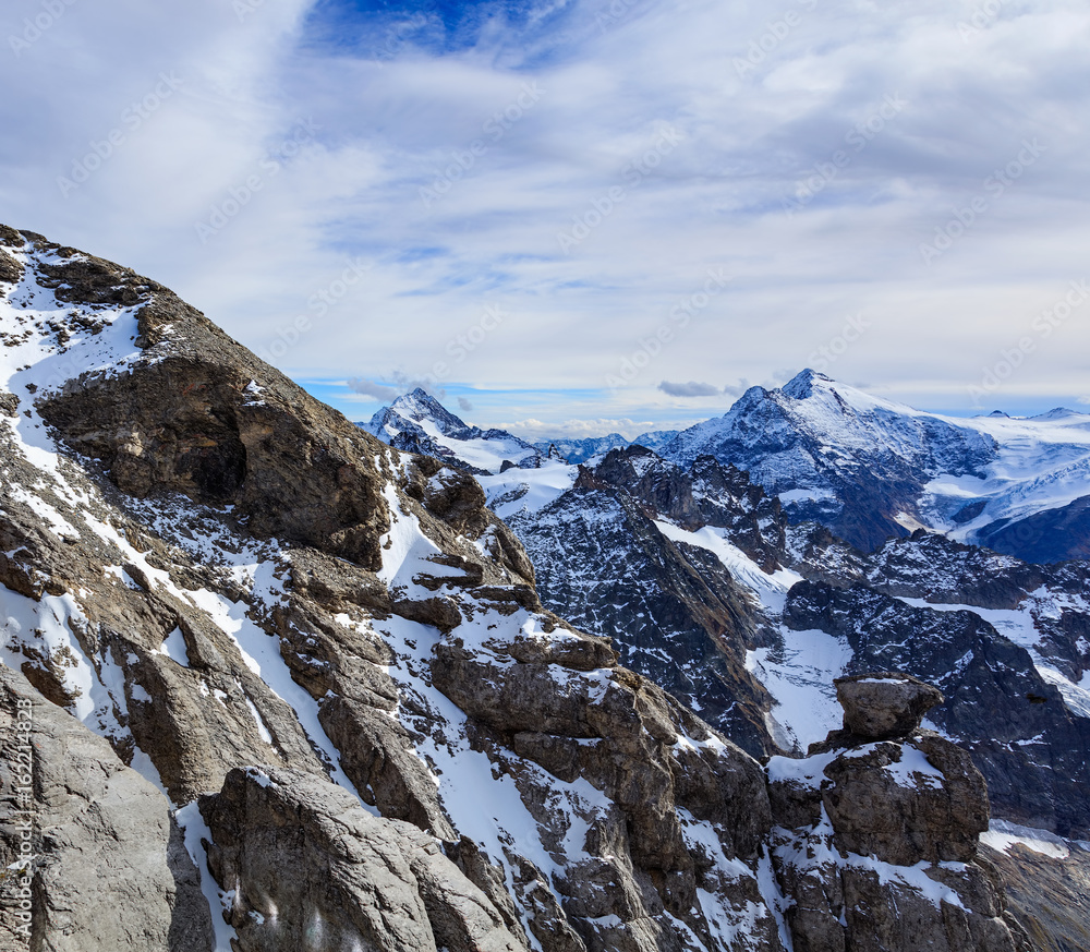 Obraz premium View from Mt. Titlis in Switzerland on a cloudy day in autumn