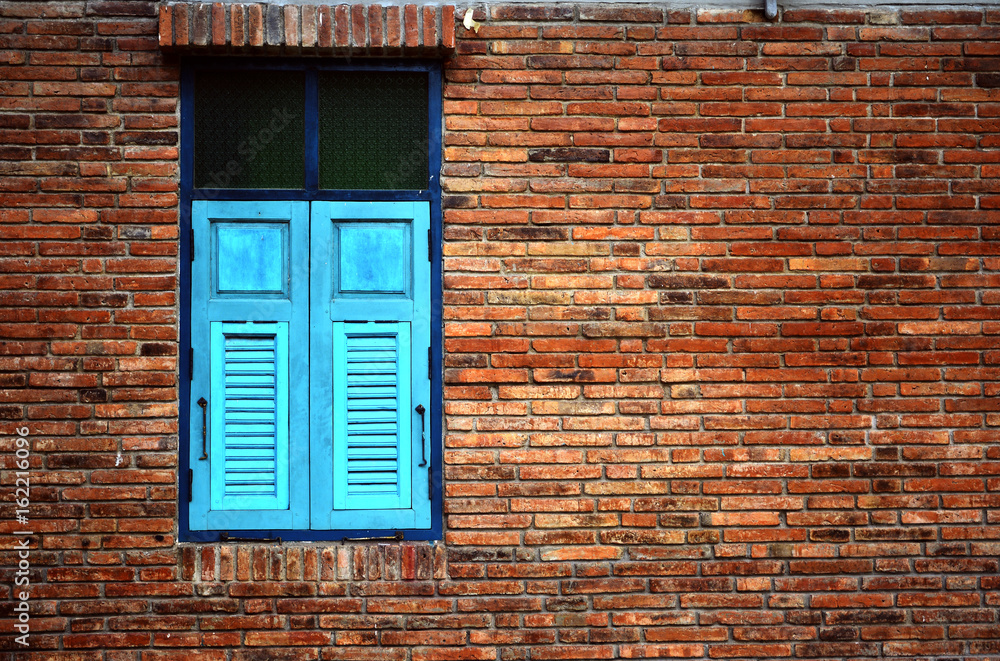 Brick wall with filled window - Old weathered brick wall with window - Crack brick wall texture background - Interior or exterior brick wall building decoration texture background Brick wall with filled window - Old weathered brick wall with window - Crack brick wall texture background - Interior or exterior brick wall building decoration texture background