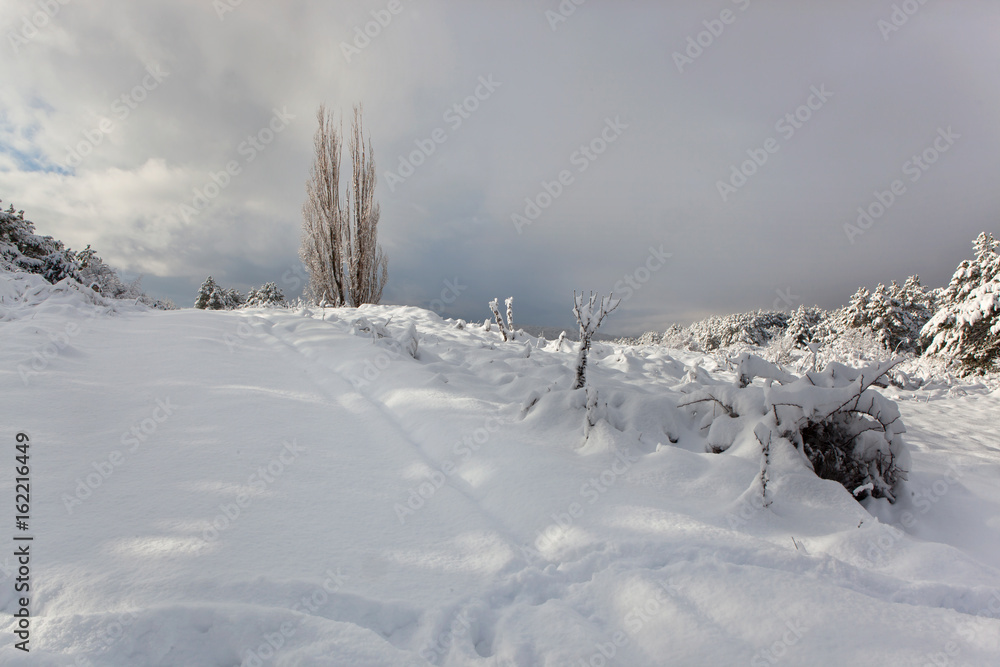 Fototapeta premium Snow covered landscape in the mountains of Crimea PtII